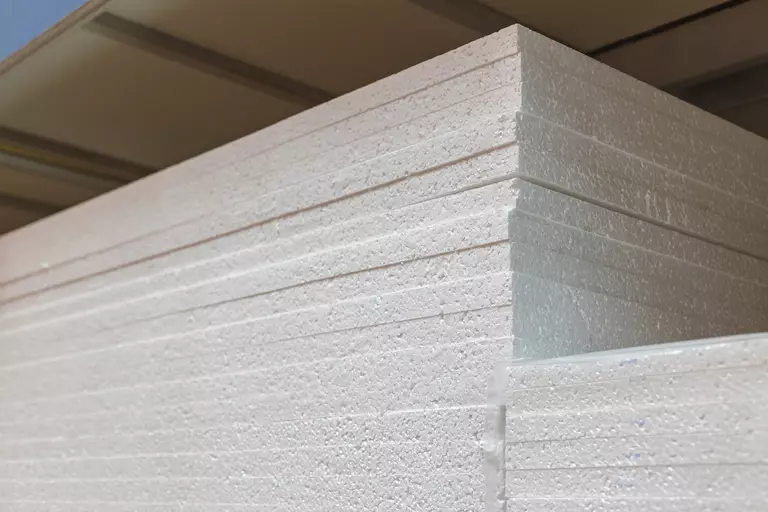 Stack of polystyrene garage door insulation.