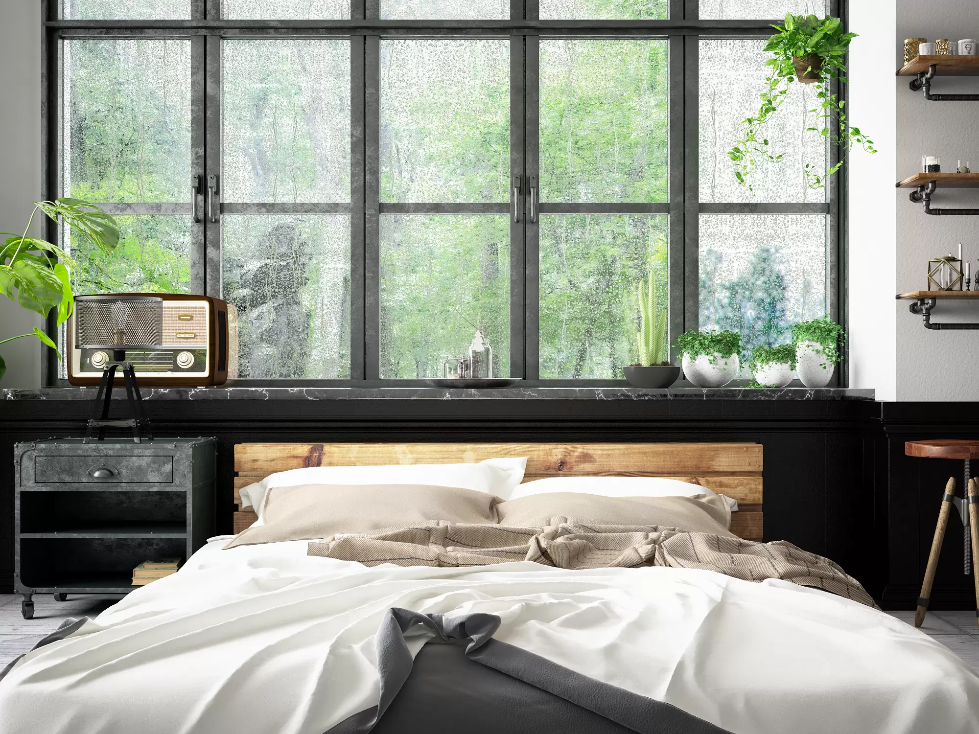 A bedroom with foggy window panes.