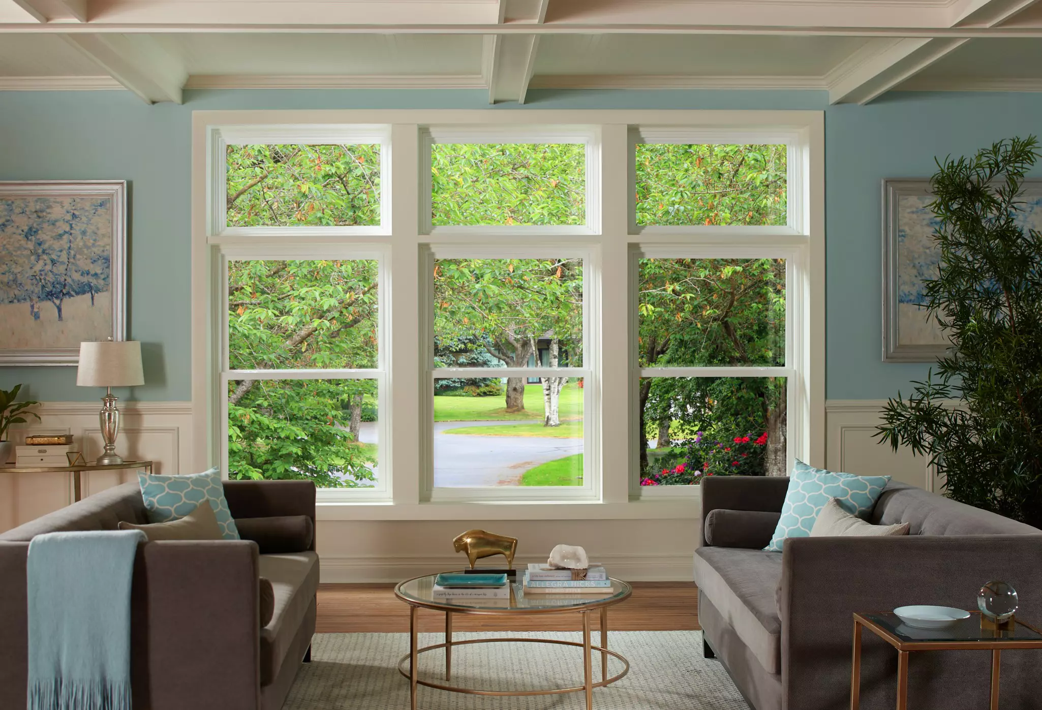 Home living room with double-hung and awning windows.