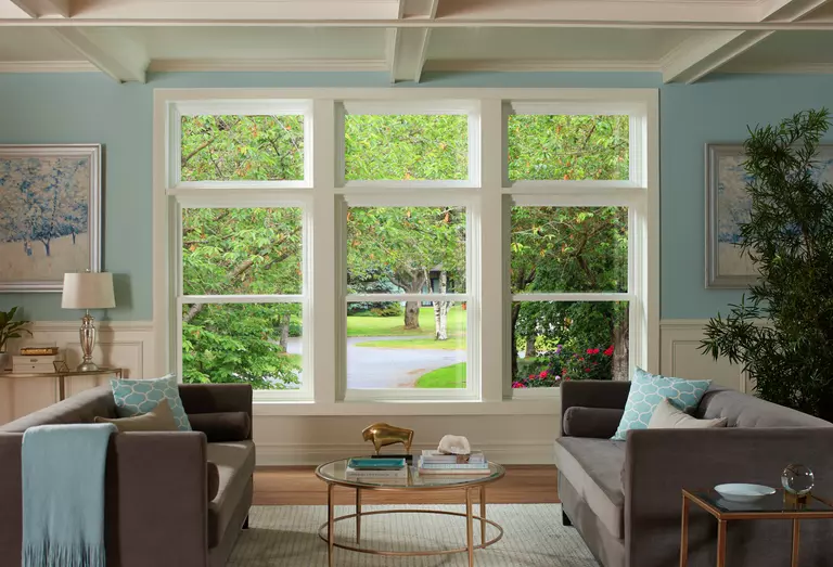 Three double-hung and awning windows mulled together.