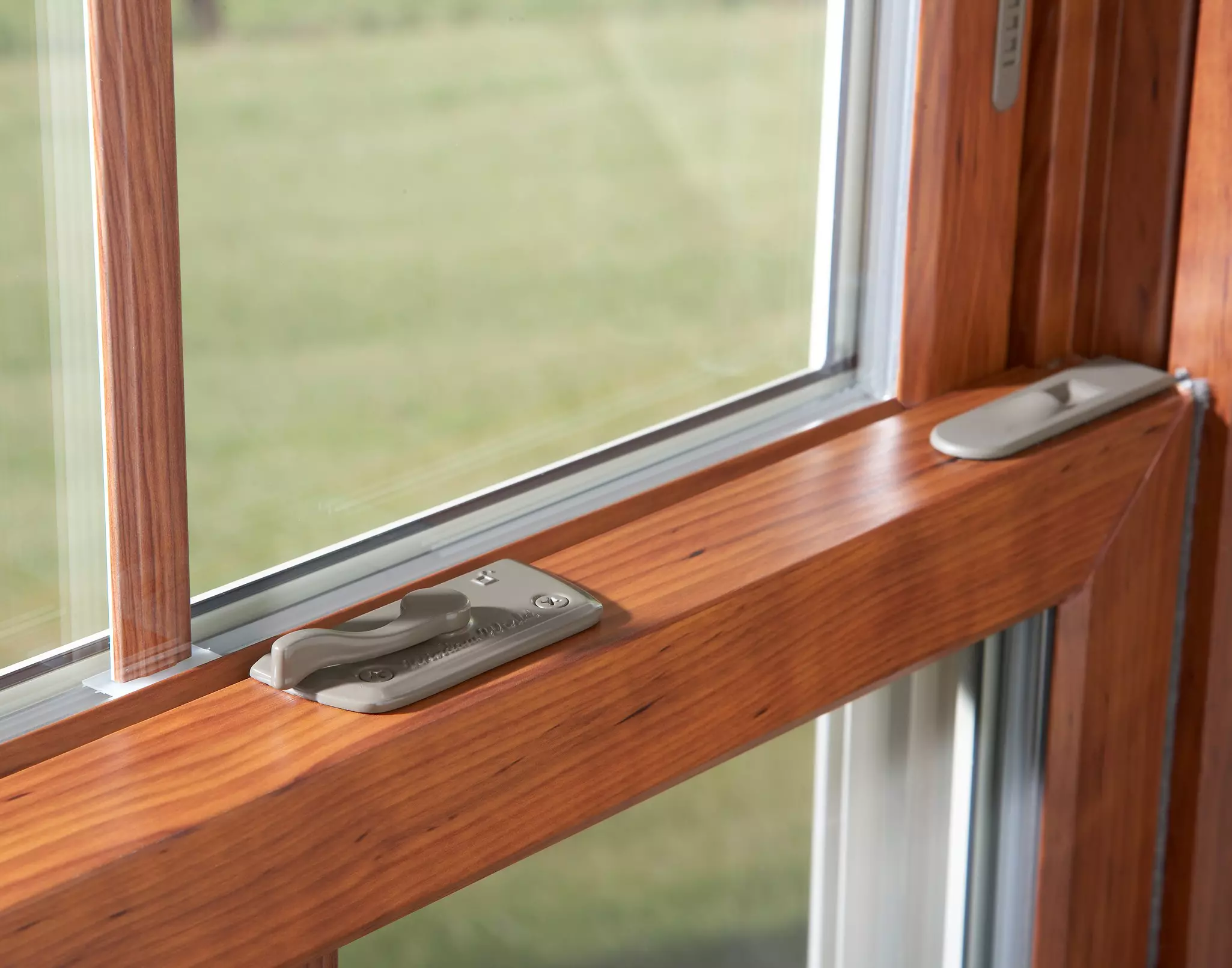 Close-up of double-hung window hardware.