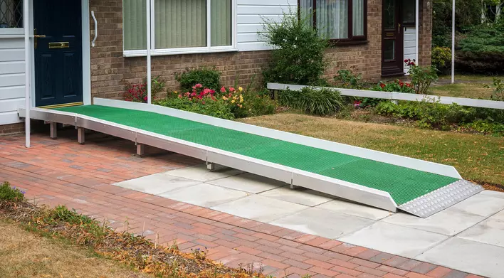 A ramp making home entry easy and accessible for an aging-in-place home.