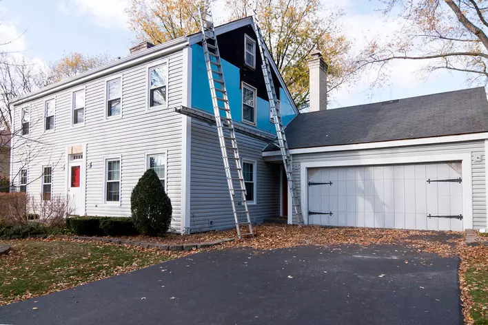 New insulated vinyl siding installation on home