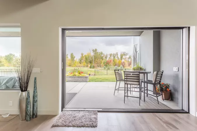 A gif showing a multi-slide patio door opening and closing fully