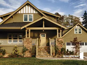 Craftsman-style home with a smooth fiberglass entry door, with a Craftsman Lite, 2-Panel Flat Shaker door style and Simulated Divided Lite glass, prefinished in French Manor.