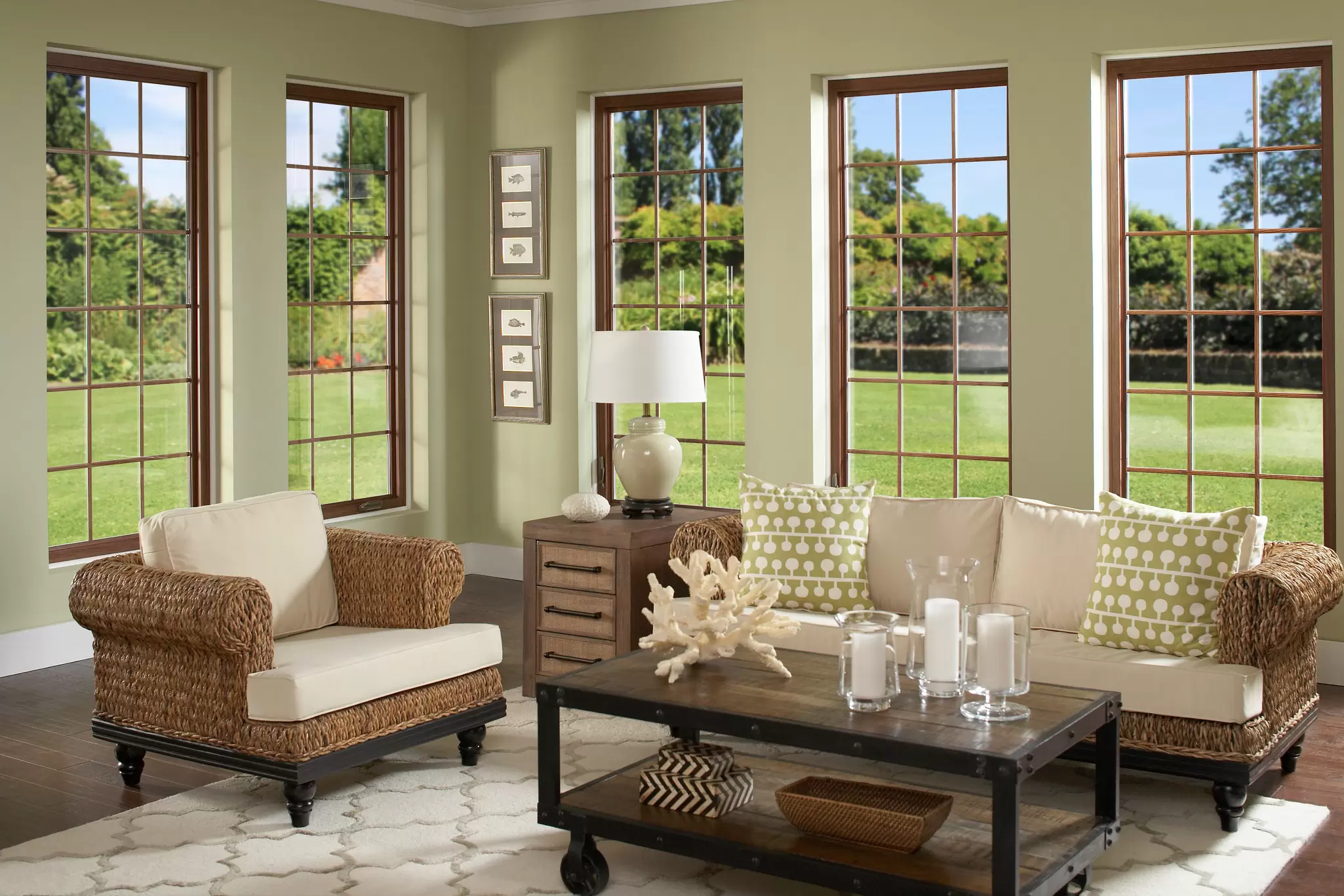 Five casement windows overlooking a backyard.