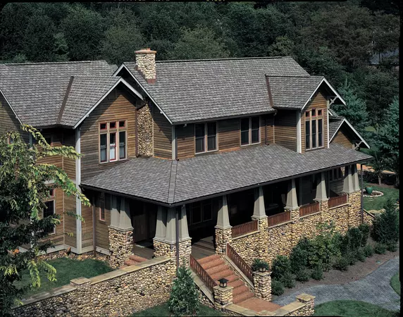 Rustic 2 story home with CertainTeed's Grand Manor shingle line in Stonegate Gray.
