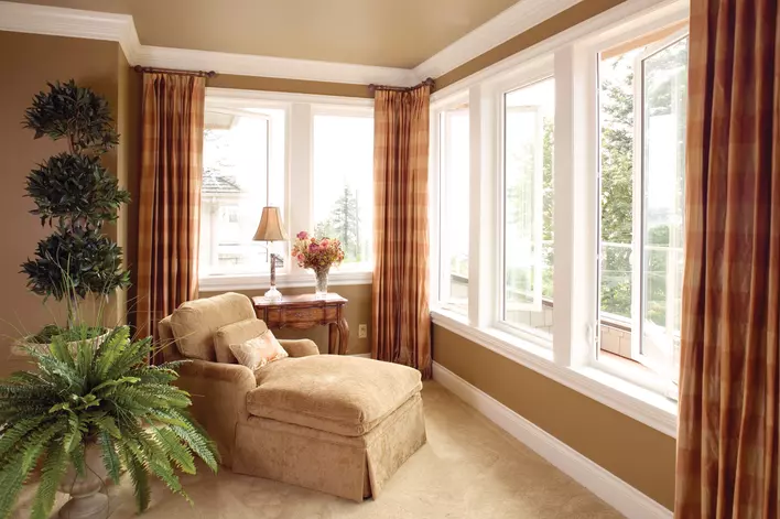 Living room with large open casement windows