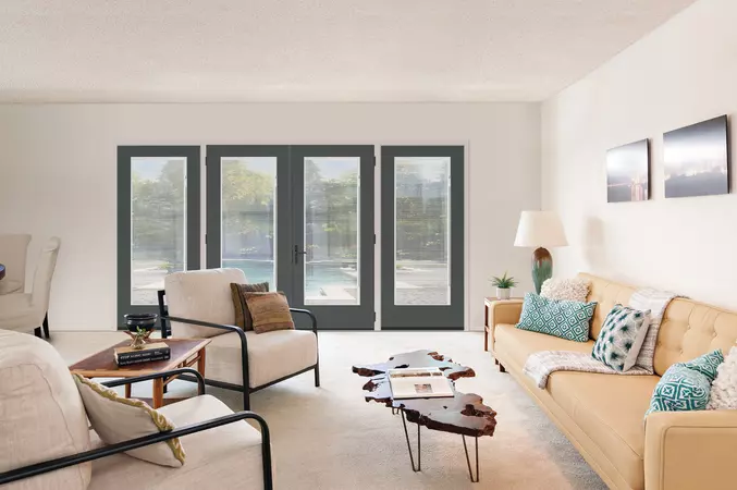 A Homburg Gray colored Smooth-Star Entry Door in a living room