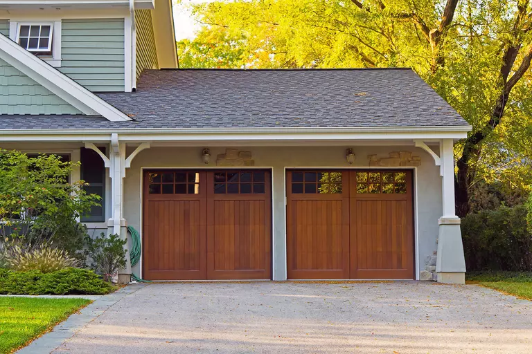 Front of two dark-brown garage doors.