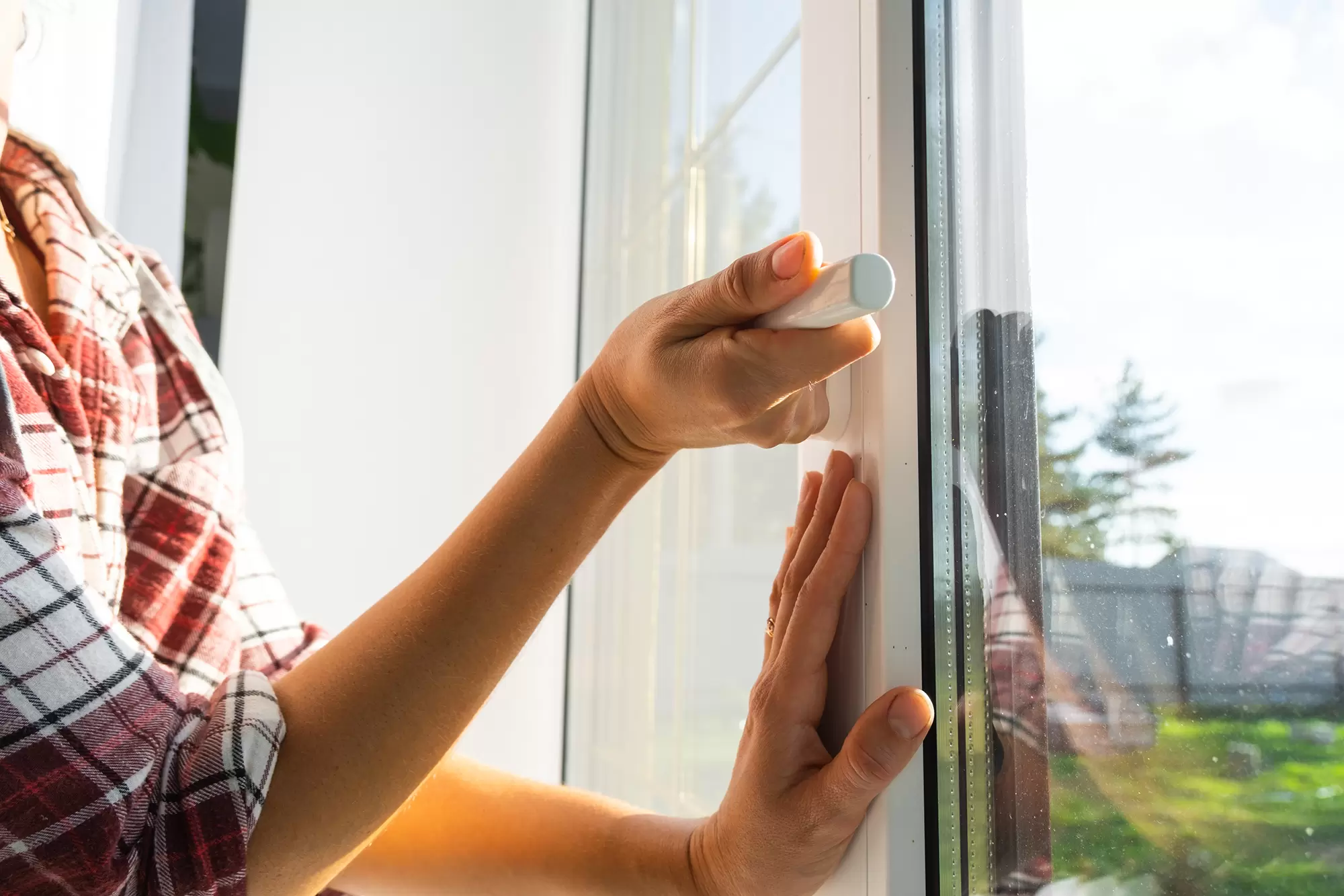 Home window being closed with a handle.