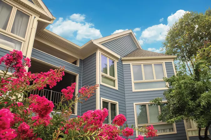 Apartment complex with ASCEND composite cladding in Harbor Blue and Monterey Sand trim
