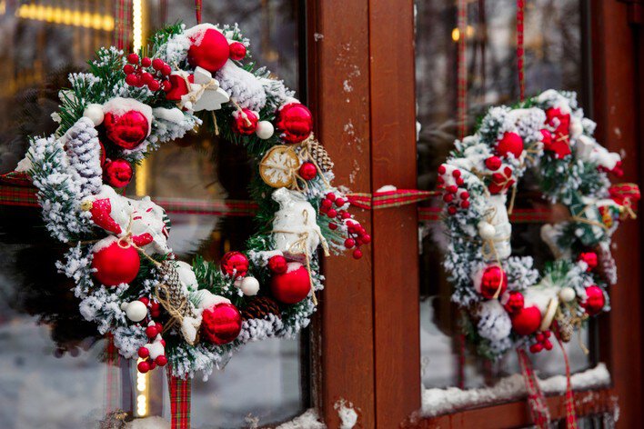 Christmas wreaths on a double front door