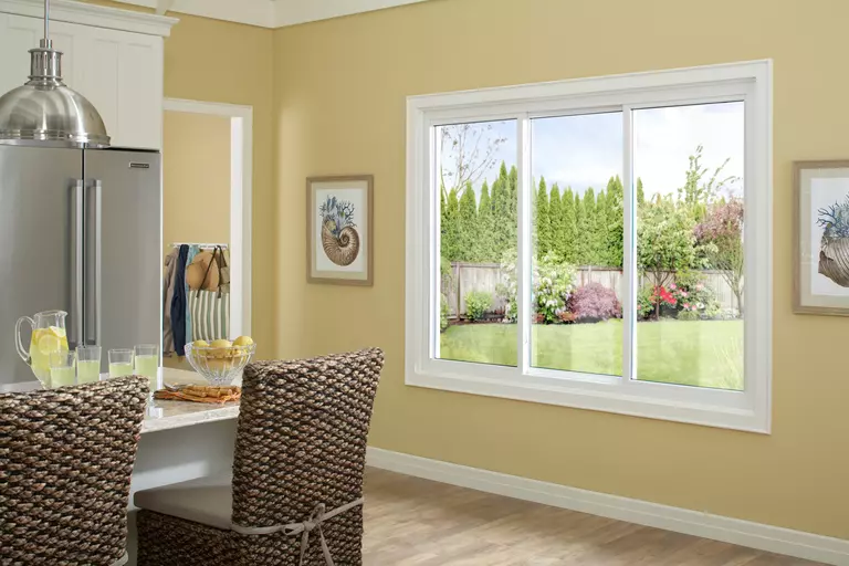 Interior of a home with a large mulled window.