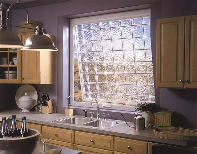 Awning window above kitchen sink open for ventilation.