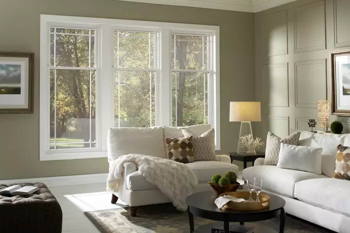 A beautiful living room with custom windows.