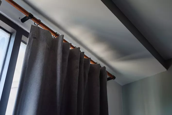 Gray blackout curtains as window treatments