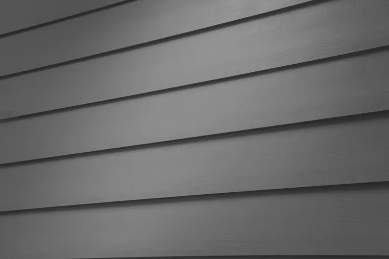 A closeup of dark gray vinyl siding.