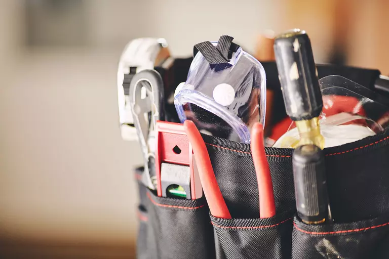 Close-up of tools used to install windows and doors.