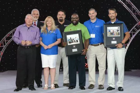 Window World Store owner Greg Deathridge receiving his award