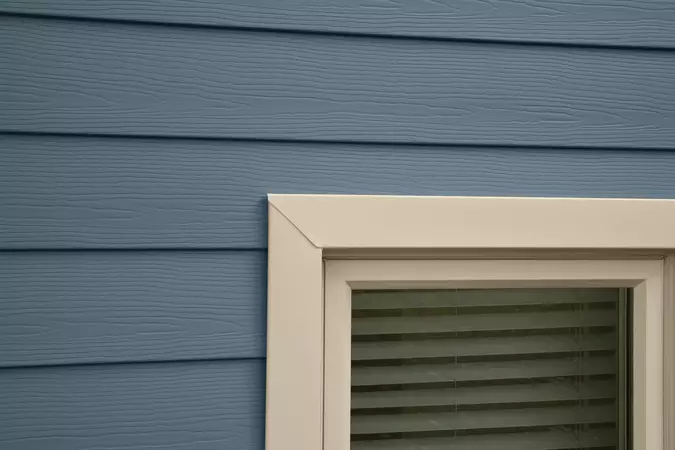 Close-up of a home with ASCEND composite cladding in Harbor Blue