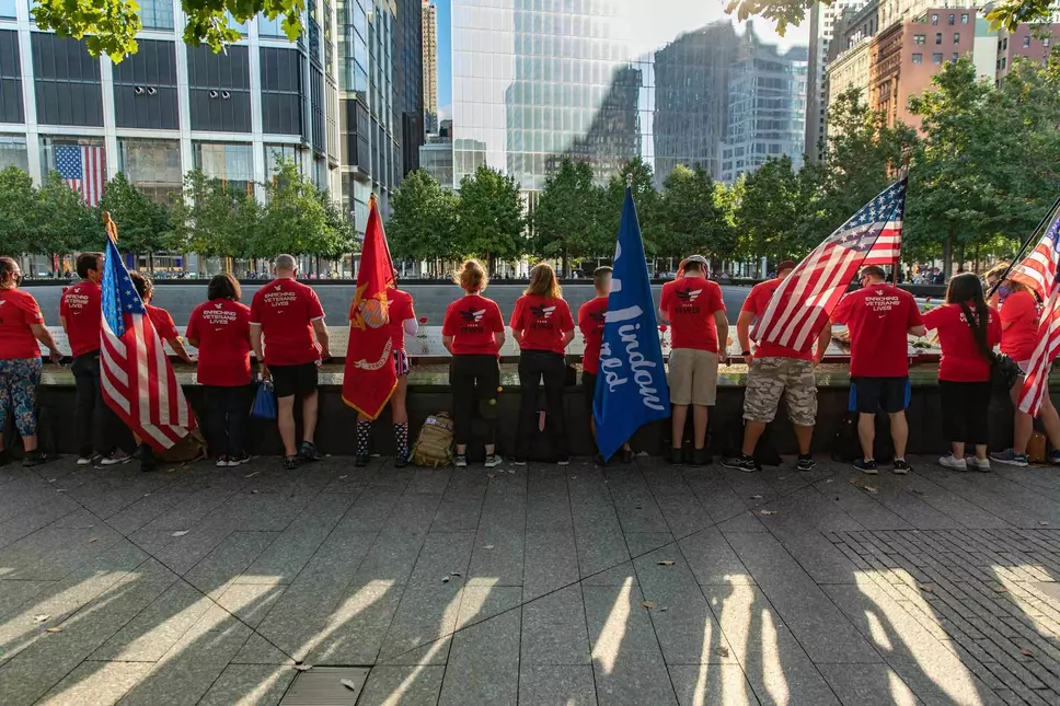 Veterans holding American flags