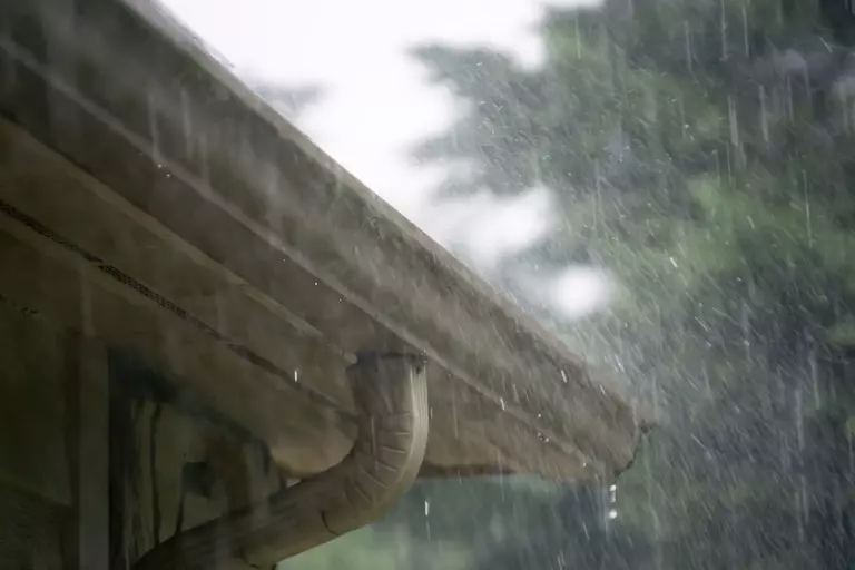 Gutter guard system of home withstanding heavy rainfall