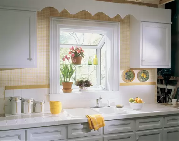 Restorations series White garden window in front of a kitchen sink
