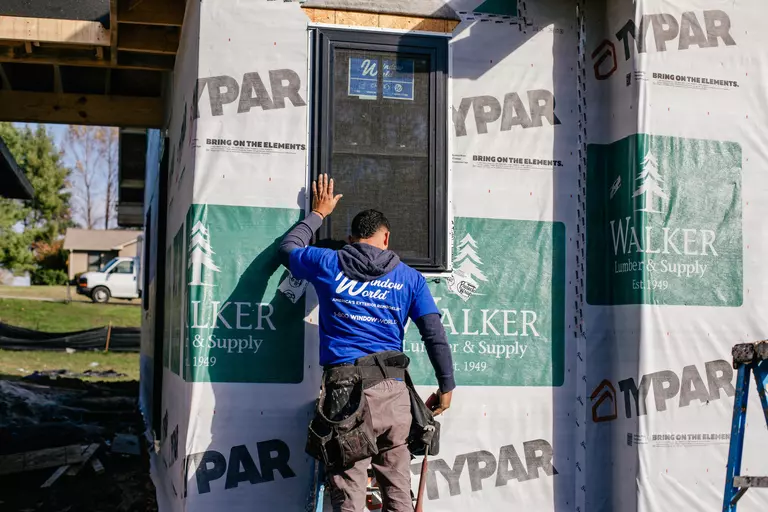 Window World professional completing a window installation.
