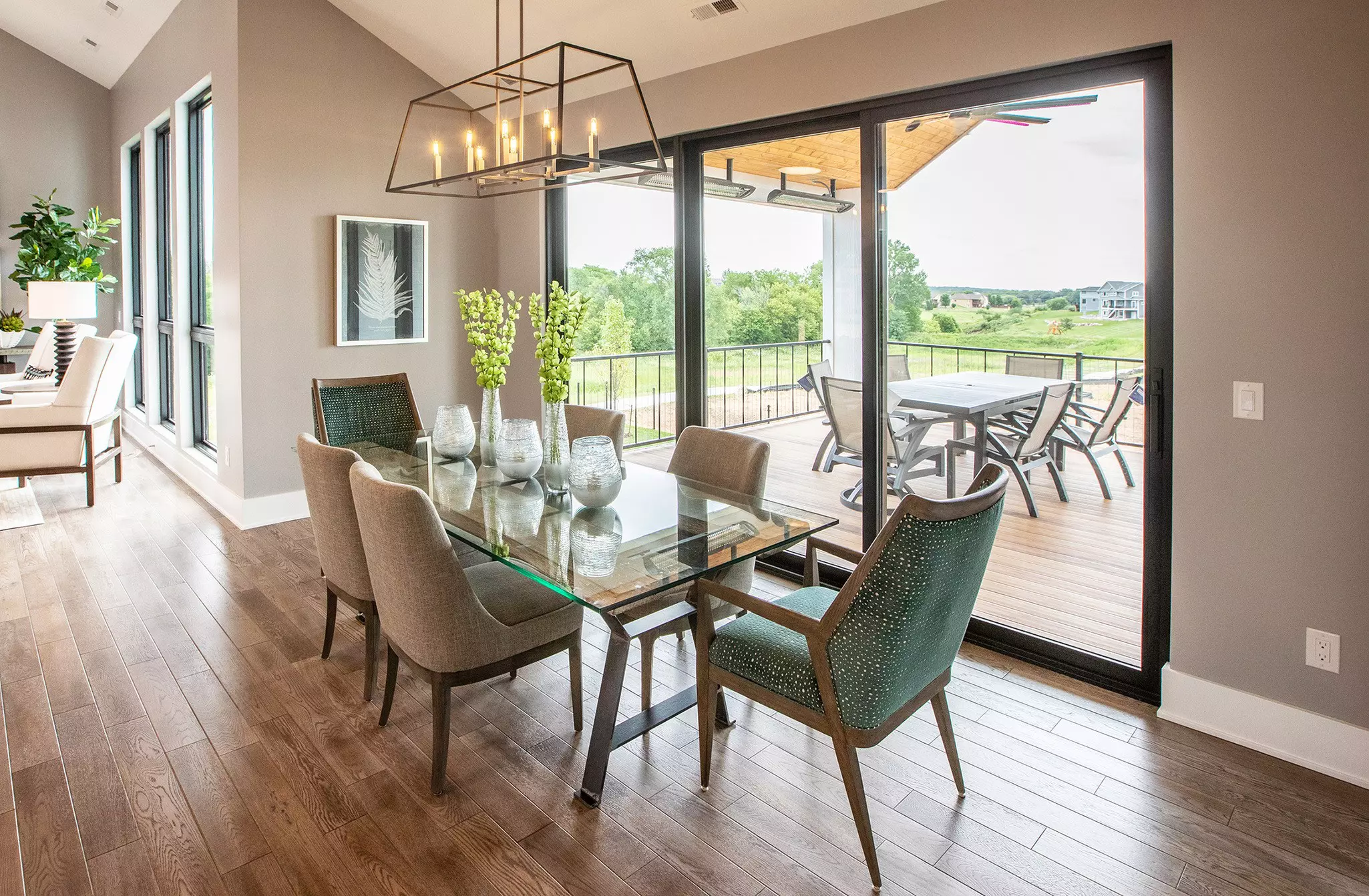 Kitchen with a black wood-clad sliding patio door in the background