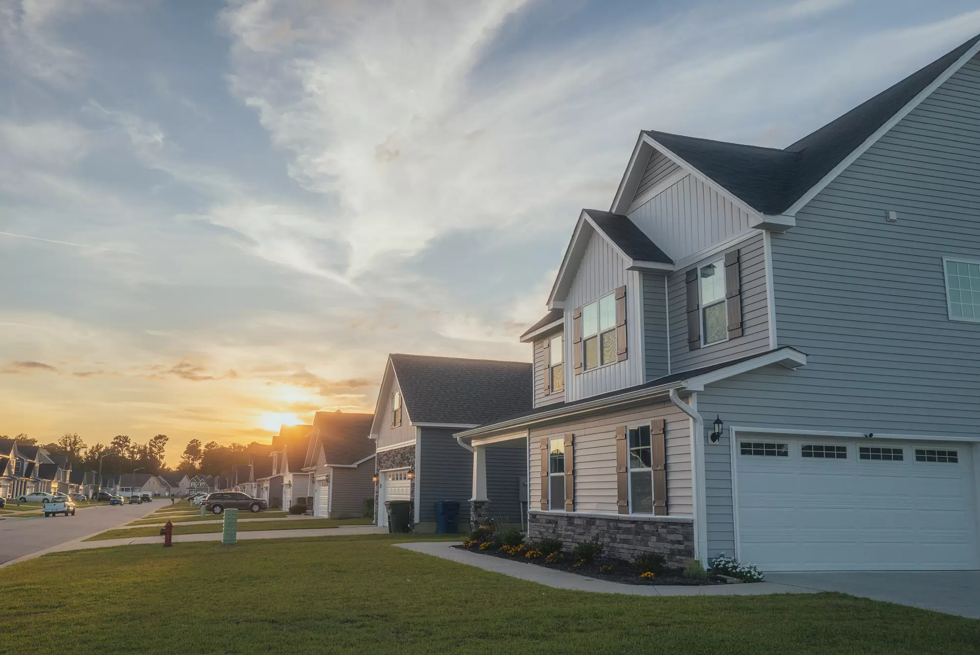 Row of modern homes in a suburban neighborhood.