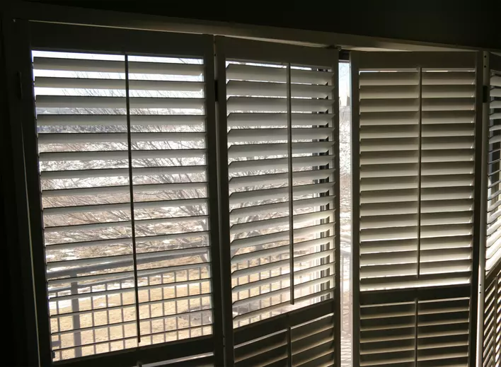Plantation shutters for patio doors as window treatments