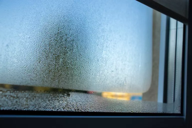 A cloudy window from moisture in between the glass.