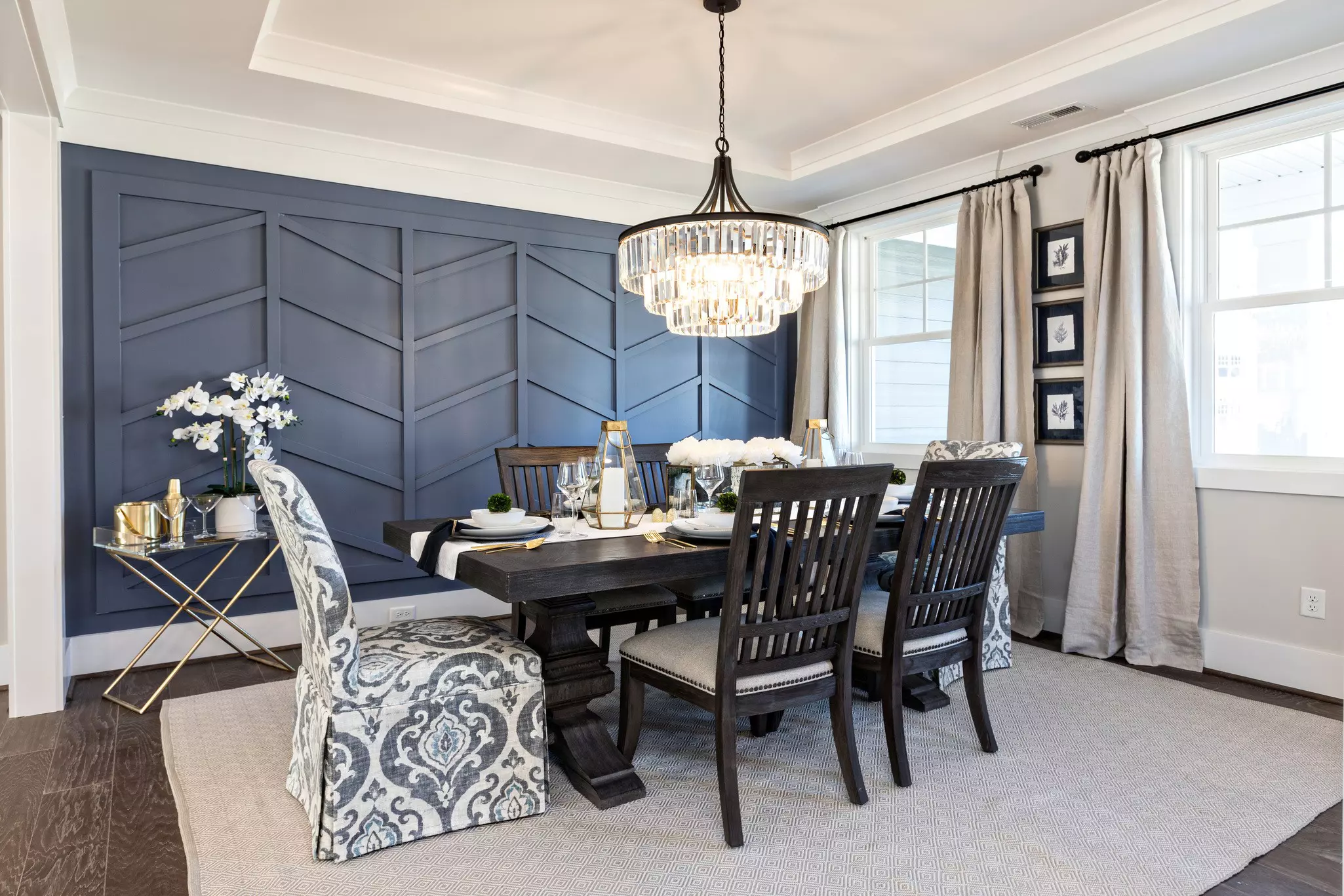 Dining room of a home with two double-hung windows.