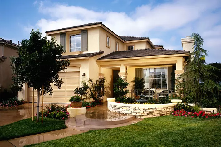 Stucco house with Spanish style roof