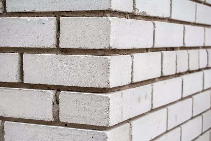 White brick exterior of a home