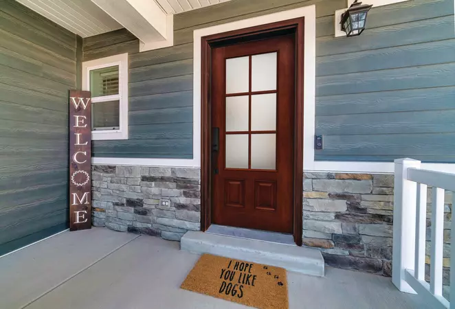Premium Textured Fiberglass door with a 3/4 Lite door style, with Baldin handleset in Venetian Bronze