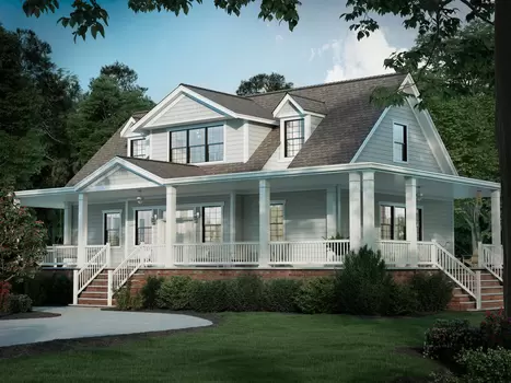 A 2-story lake house with Window World Double-Hung Windows