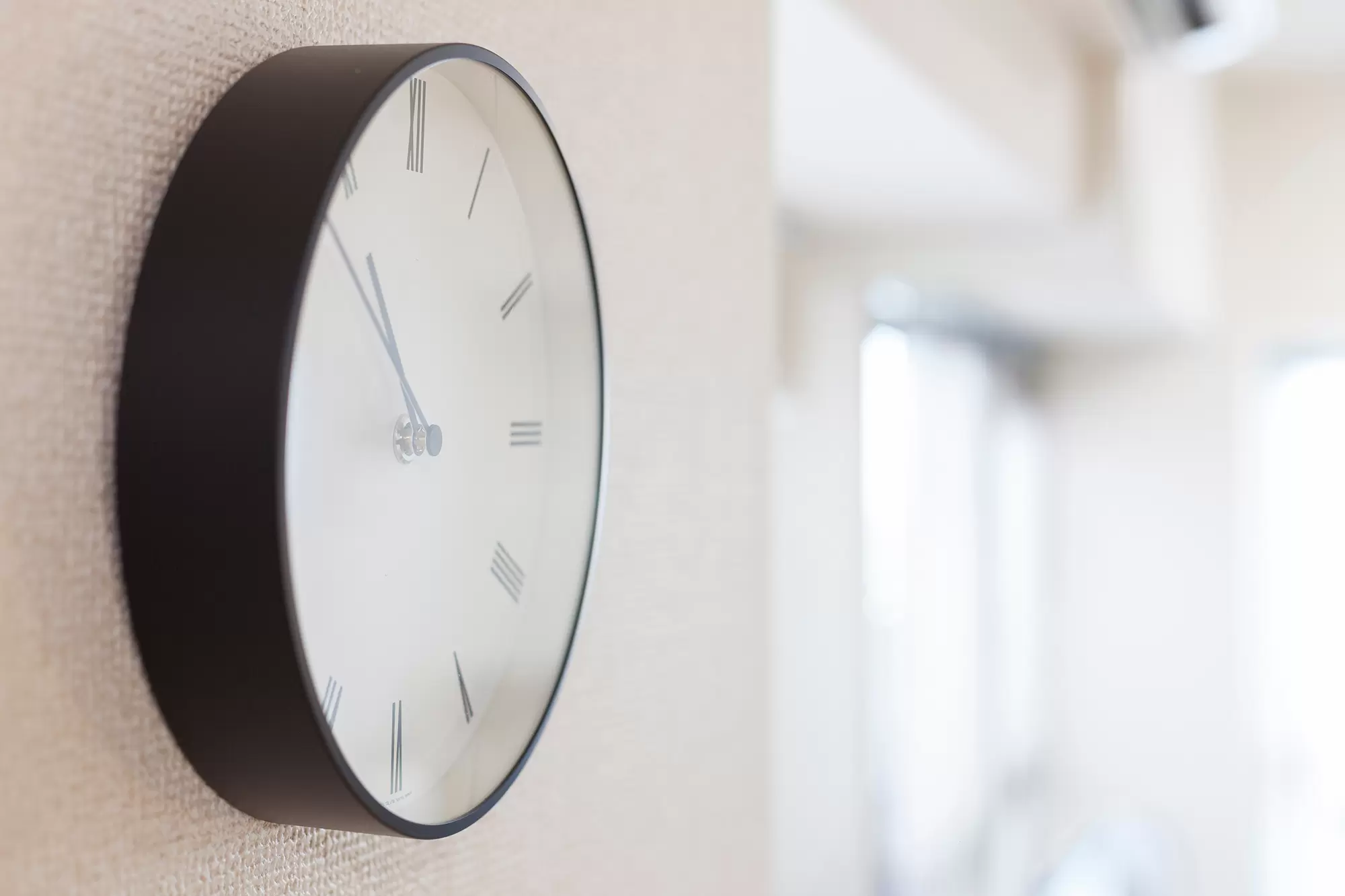 Analog wall clock.