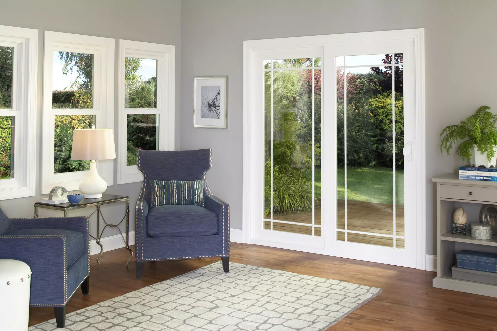 A living room with a sliding patio door