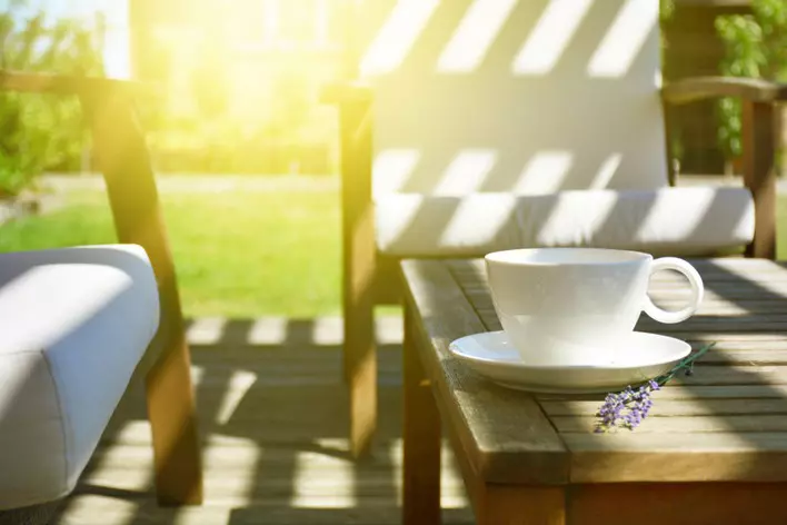 Coffee cup on porch
