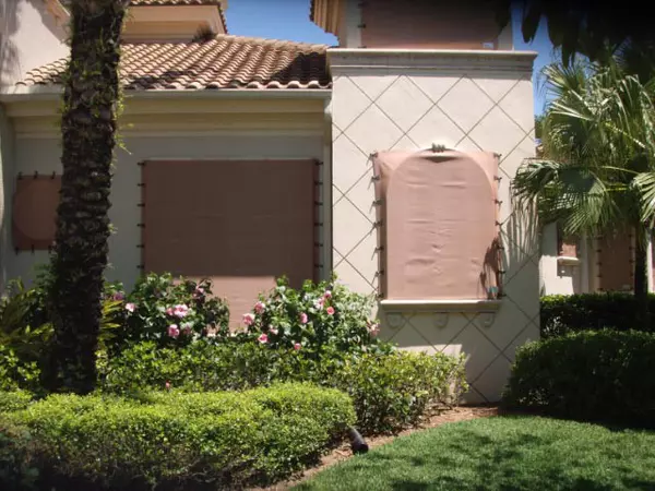 Tan Fabric Panels covering windows