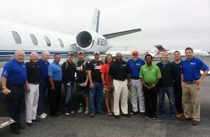Greg Deathridge outside of the VAC jet with Veterans