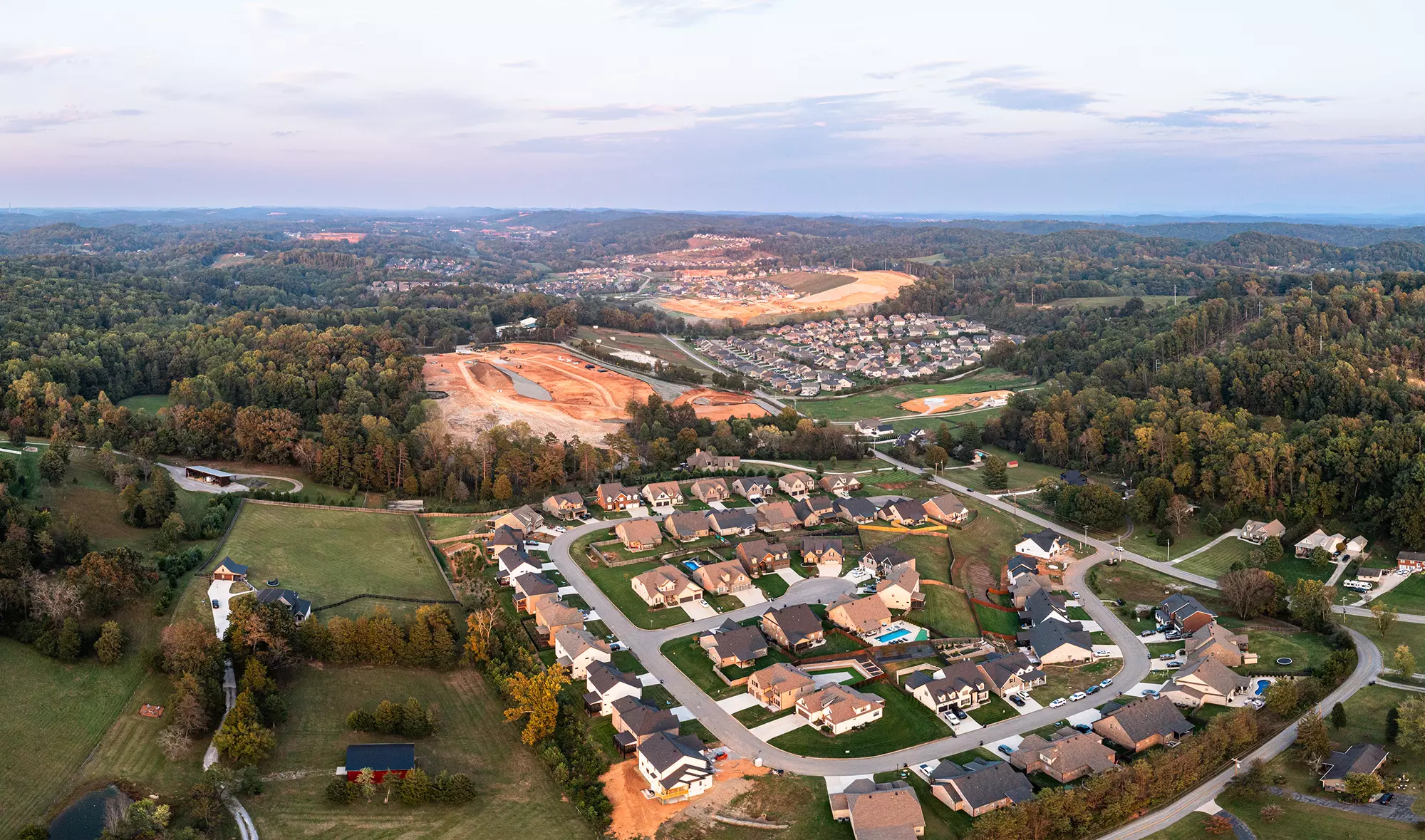 Aerial view of a suburban community under development.