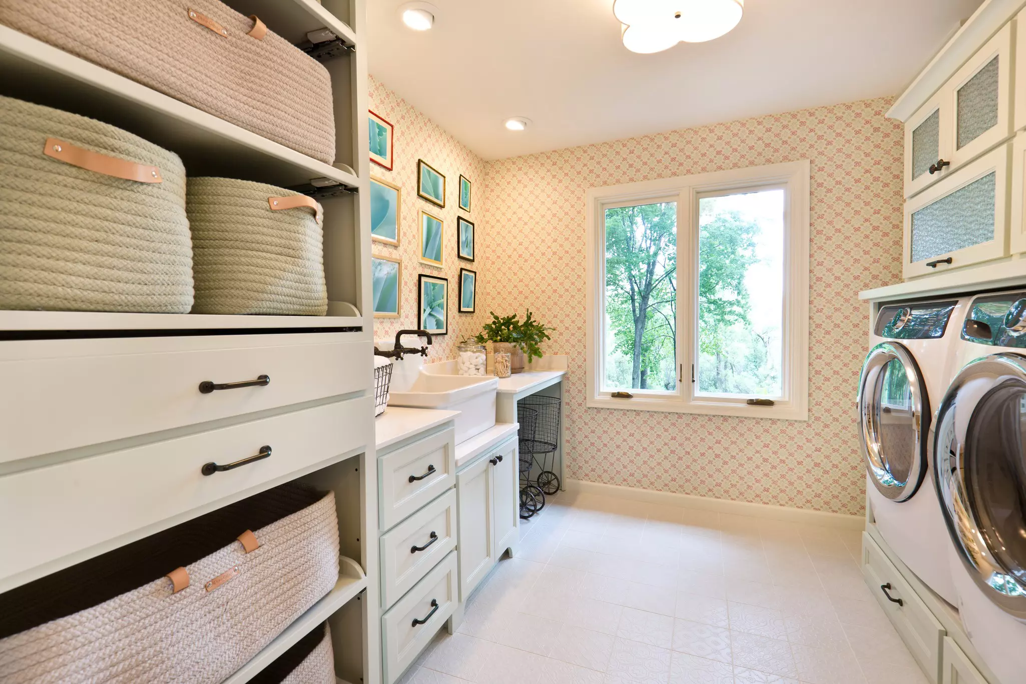 A laundry room in a modern home with many storage solutions