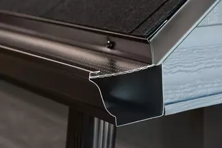 Close-up of Dual Defense DoublePro® Gutter System on a home