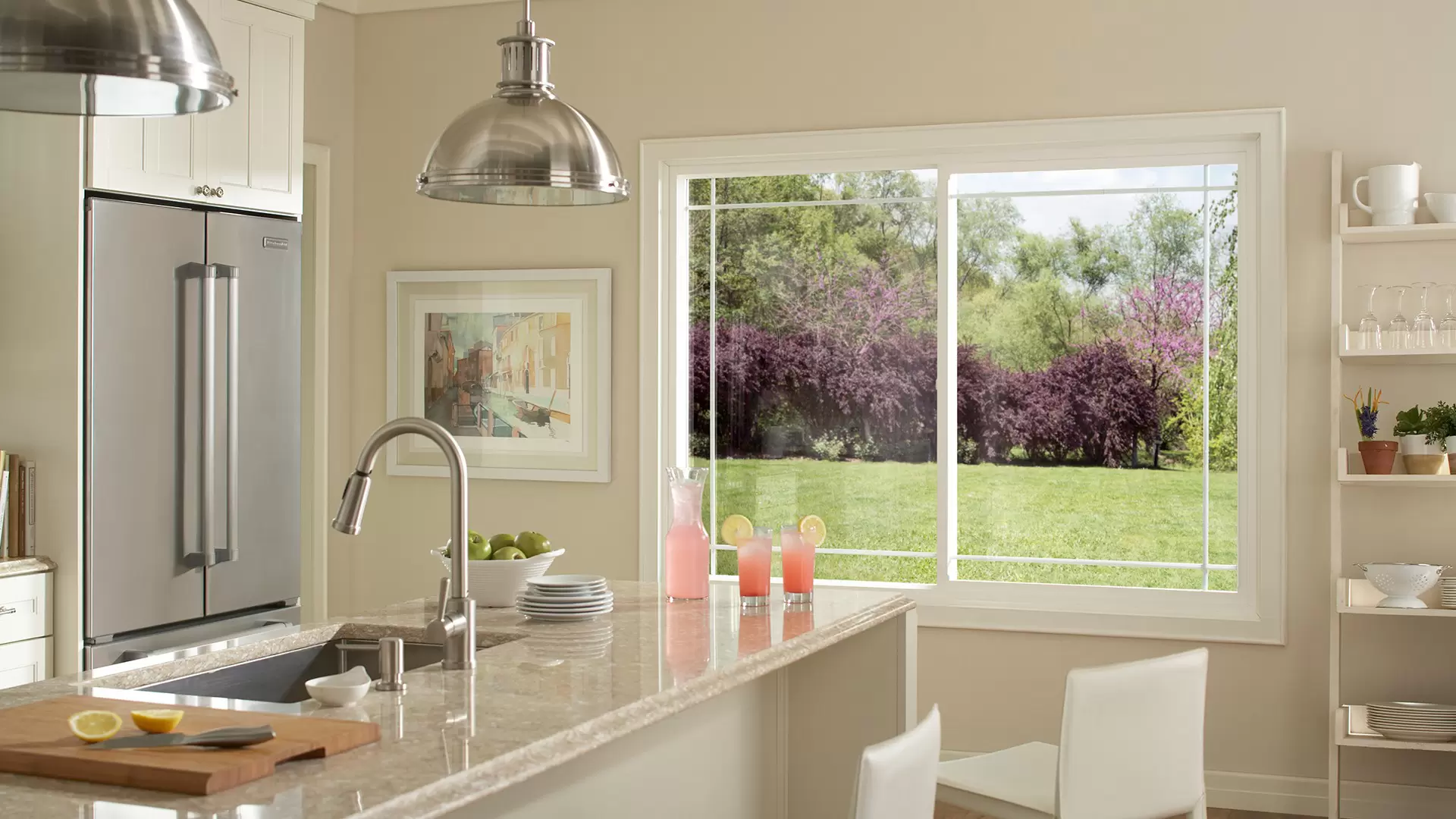ENERGY STAR windows in a kitchen with a view of the yard.