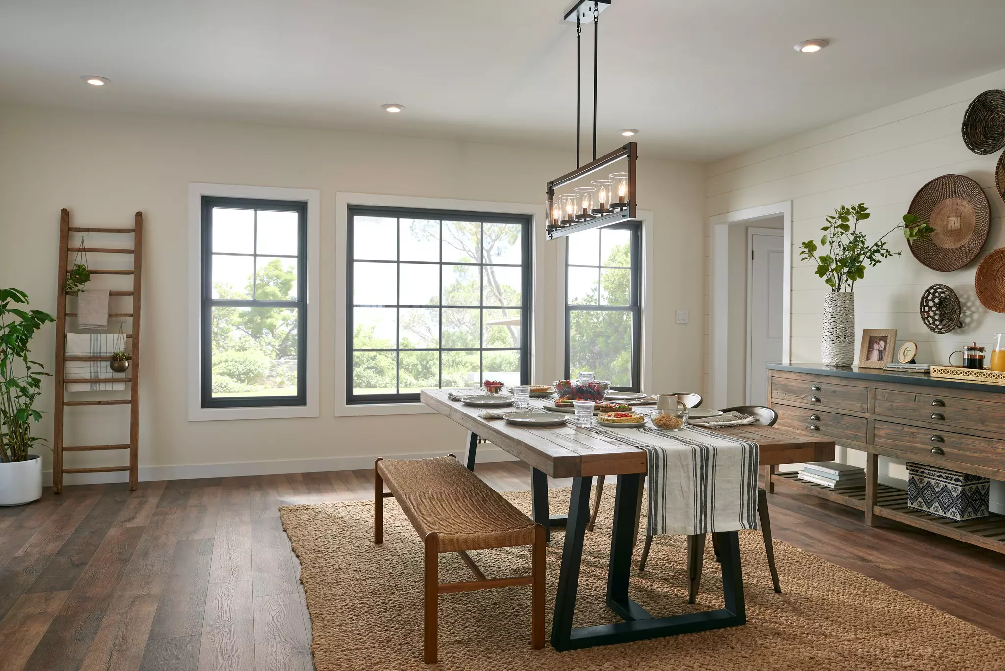 Large windows giving a dining room natural light.