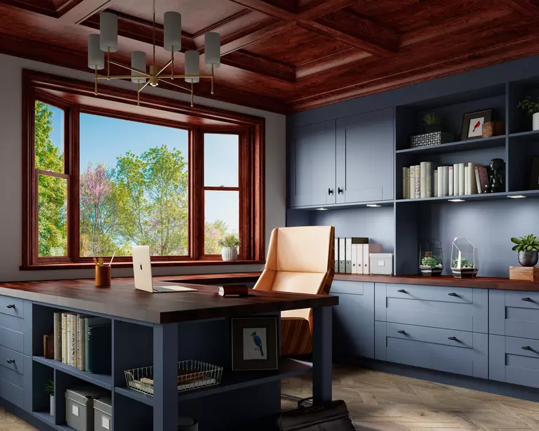Interior of a home office with a bay window featuring interior wood-look cladding.