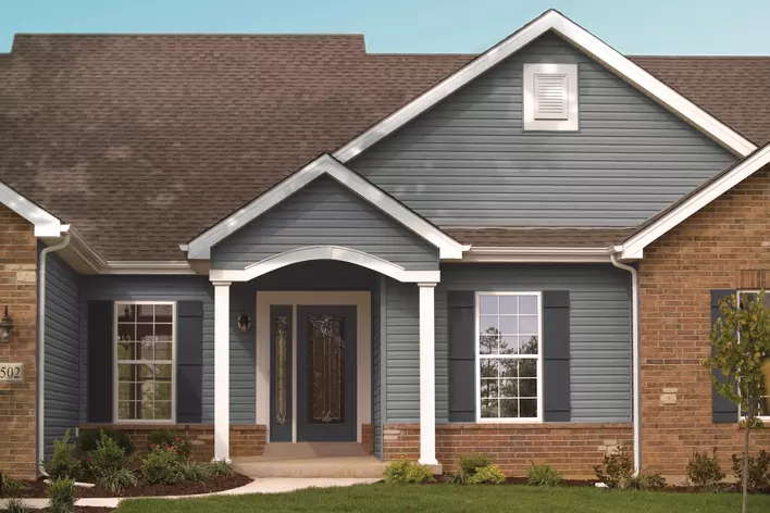 An Asheville home with energy-efficient windows and shutters to help add curb appeal to
the property.